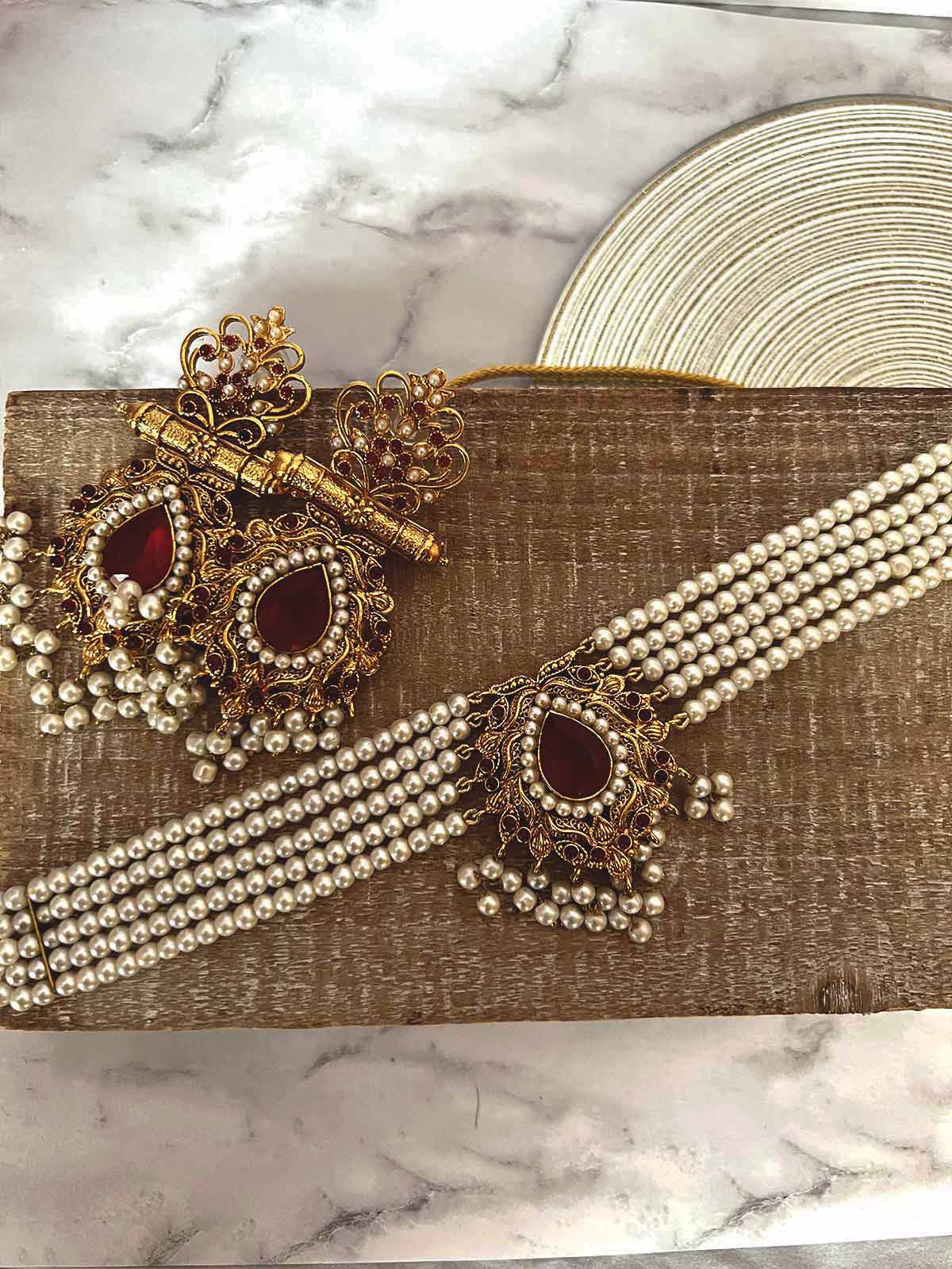 Na’aira- Pearl chokar set with maroon(deep red) stones