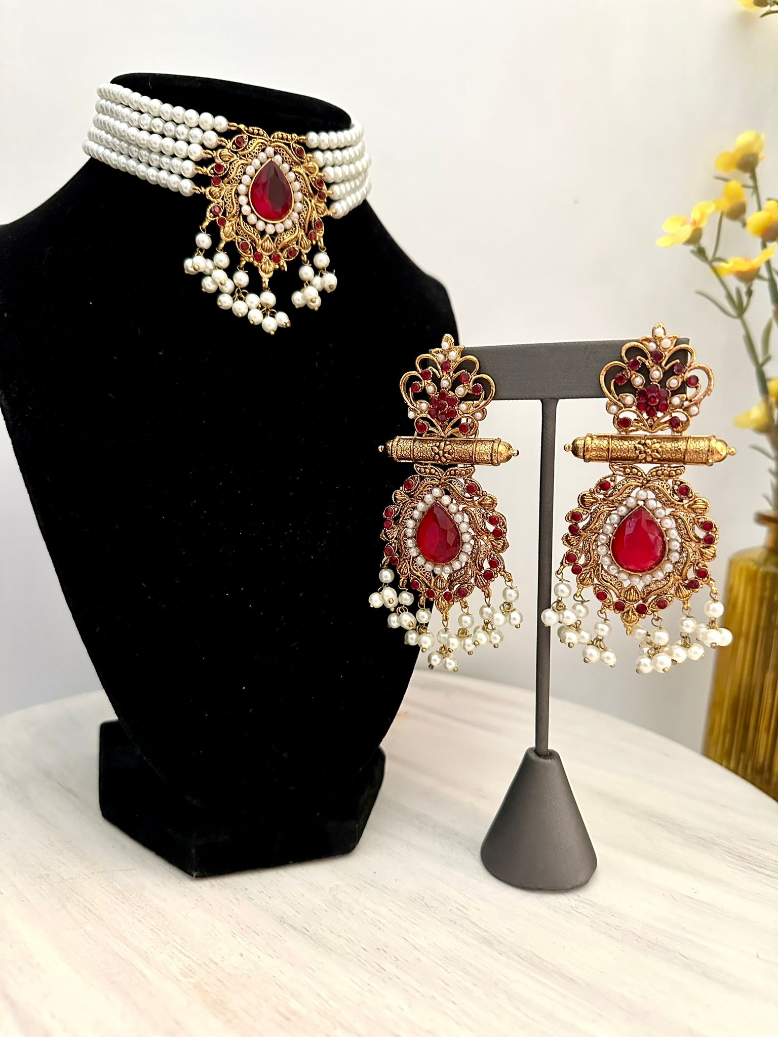 Na’aira- Pearl chokar set with maroon(deep red) stones